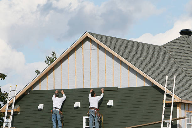 Professional Siding technician working in East Flat Rock, NC